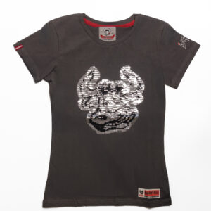 Das Damen T-Shirt Pailetten aus dem Shop Kuhstall ist ein kurzärmliges, dunkelgraues T-Shirt mit einem glänzenden, silbernen Pailletten-Design in Form eines gehörnten Helms auf der Vorderseite und Markenetiketten am Kragen, Ärmel und unteren Saum.